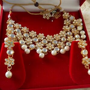 Brand new Beautiful necklace & erring with beautiful velvet box